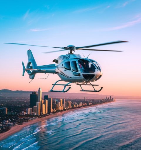 Altitude Helicopter aircraft N1460 flying over coastal cityscape